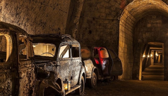 Abandoned tunnel under Naples, which became a crypt for cars