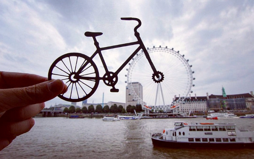 British photographer modifies famous landmarks with paper and scissors