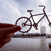 British photographer modifies famous landmarks with paper and scissors