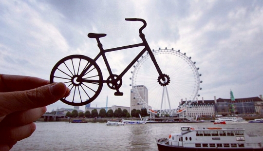 British photographer modifies famous landmarks with paper and scissors