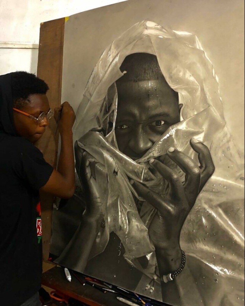 Charcoal portraits of hyperrealist Major Olajide