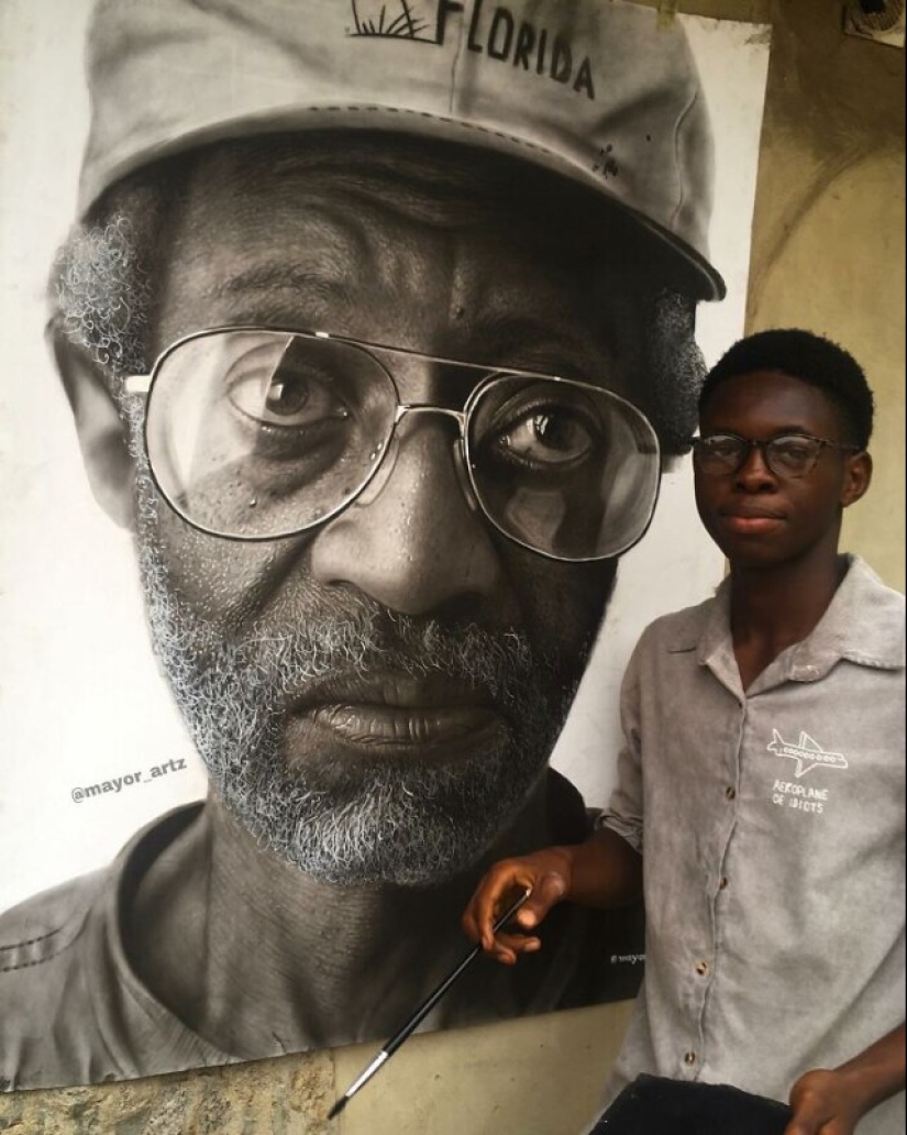 Charcoal portraits of hyperrealist Major Olajide