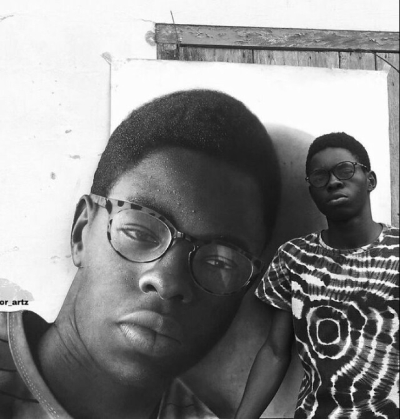 Charcoal portraits of hyperrealist Major Olajide