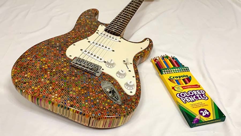 Cómo crear una guitarra única? Necesitamos 500 dólares, 1200 lápices de colores, entusiasmo y tiempo