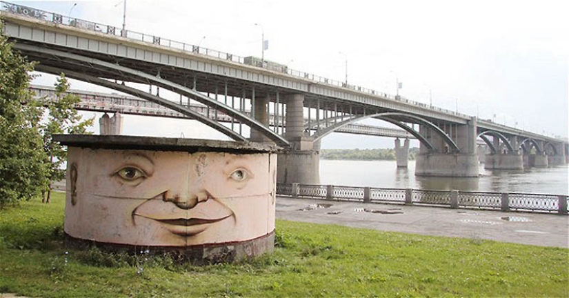 Faces on buildings by Nikita Nomerz