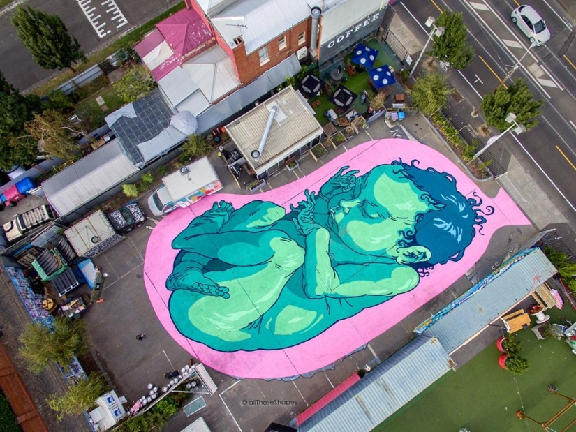 Giant murals on the ground by Australian Kitt Bennett