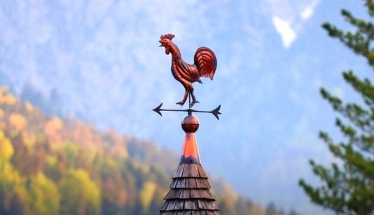 How did the weather vane appear and what tasks did it perform in different eras?