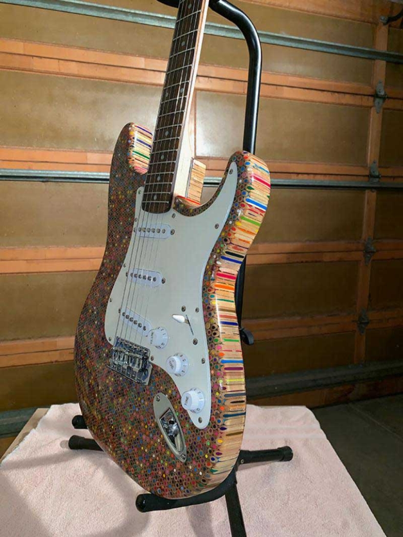 How to create a unique guitar? We need 500 dollars, 1200 colored pencils, enthusiasm and time