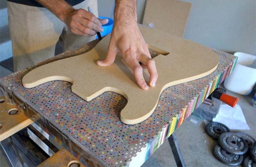 How to create a unique guitar? We need 500 dollars, 1200 colored pencils, enthusiasm and time