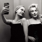 Hungarian photographer flora Borsi and her selfie with the stars of the past