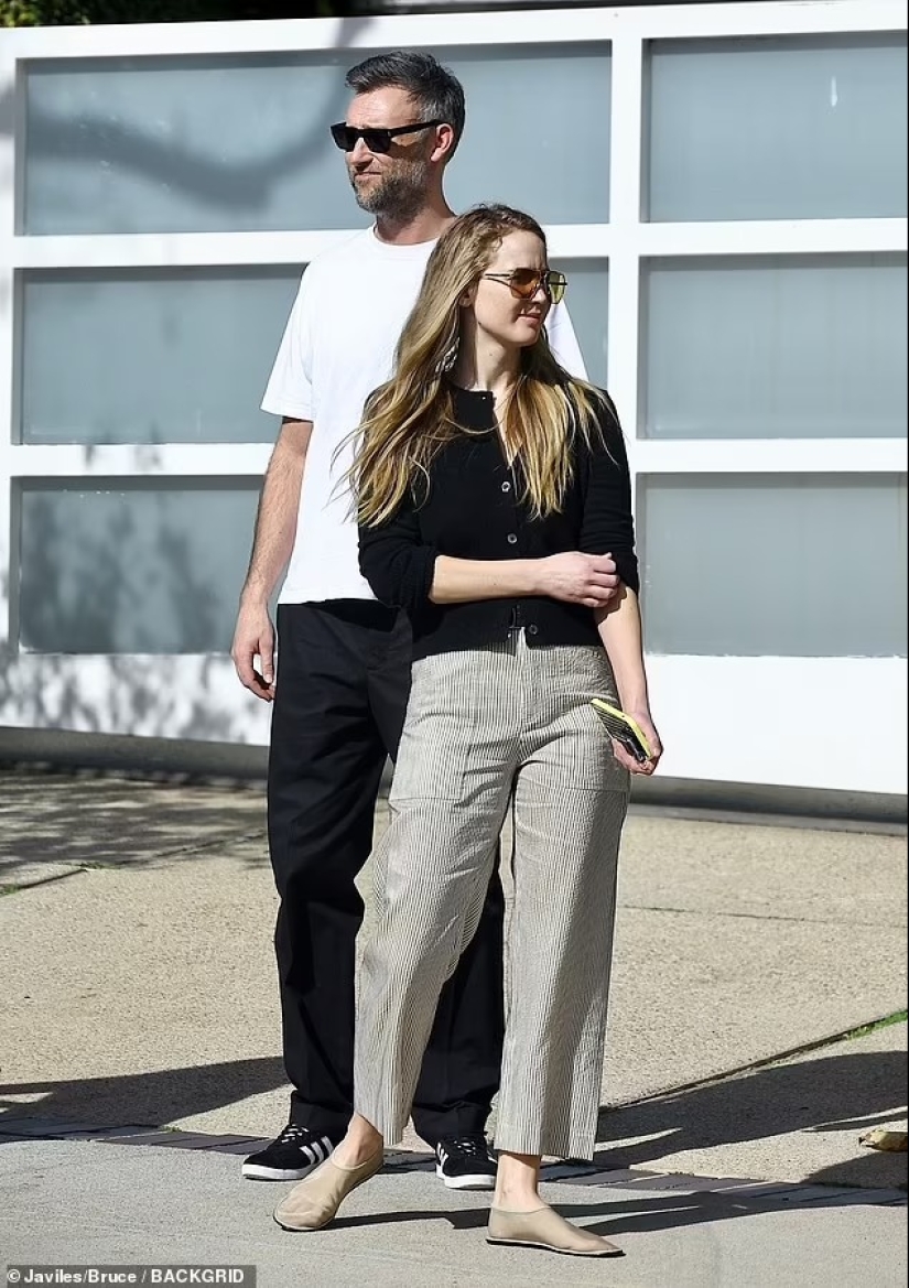Jennifer Lawrence looks chic in black sweater and patterned pants as she goes house-hunting with husband Cooke Maroney in Beverly Hills