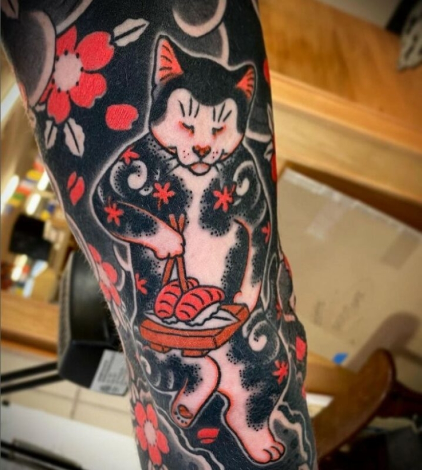 Magnificent tattoos in the form of tattooed cats from a Japanese artist