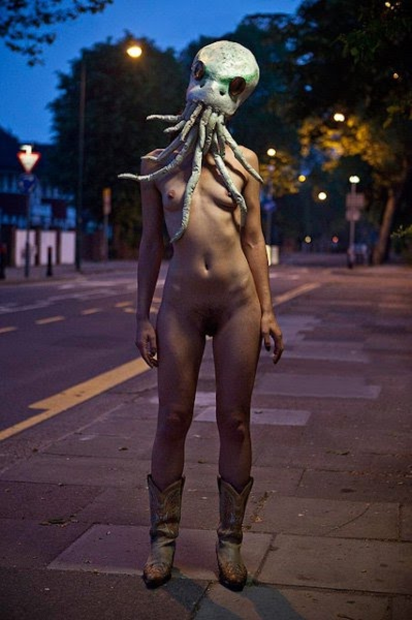 Naked girls in masks by Ben Hopper