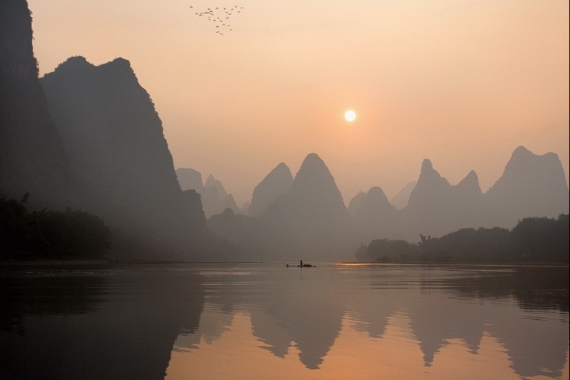 Pesca tradicional china con cormoranes