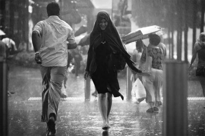 Rainy mood: a photographer from Singapore catches the emotions of people during a downpour