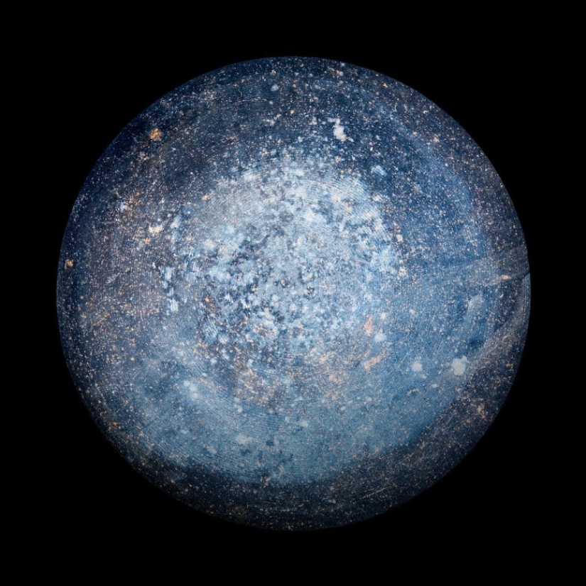 "Space pictures" of the bottoms of old pots and pans from photographer Christopher Jonassen