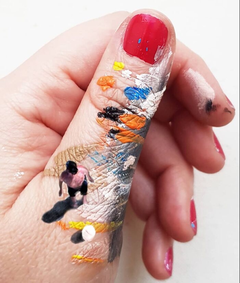 The artist uses her hands as a canvas to show hidden worlds