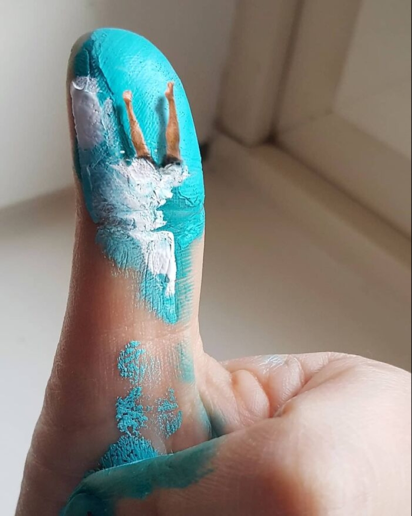 The artist uses her hands as a canvas to show hidden worlds