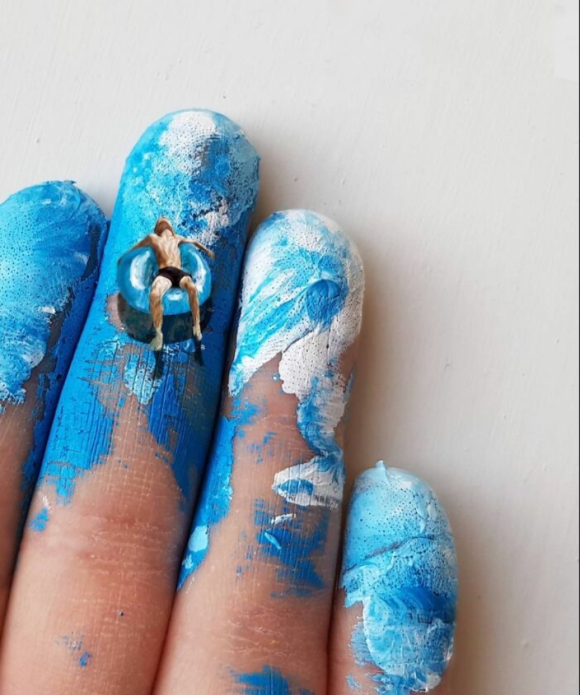 The artist uses her hands as a canvas to show hidden worlds