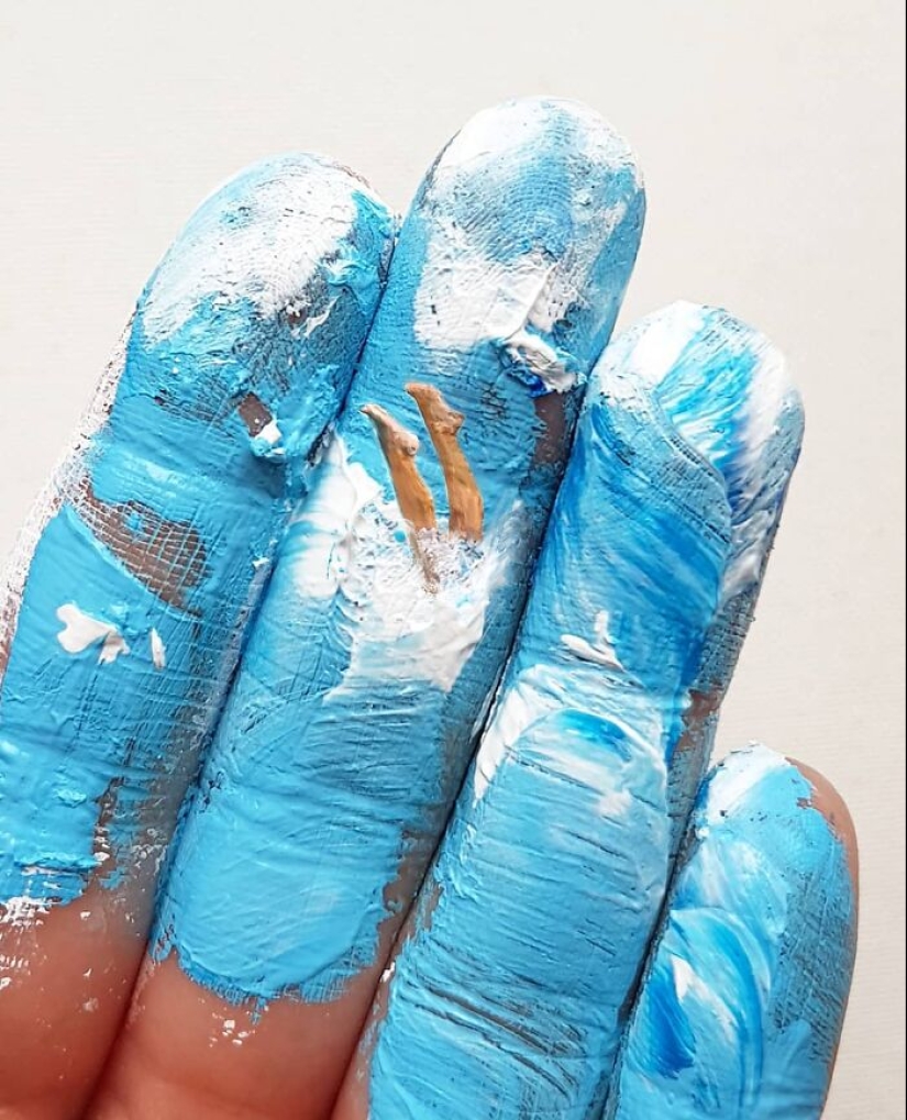 The artist uses her hands as a canvas to show hidden worlds