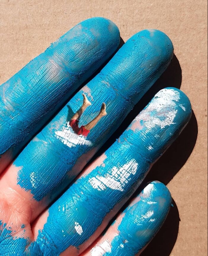 The artist uses her hands as a canvas to show hidden worlds