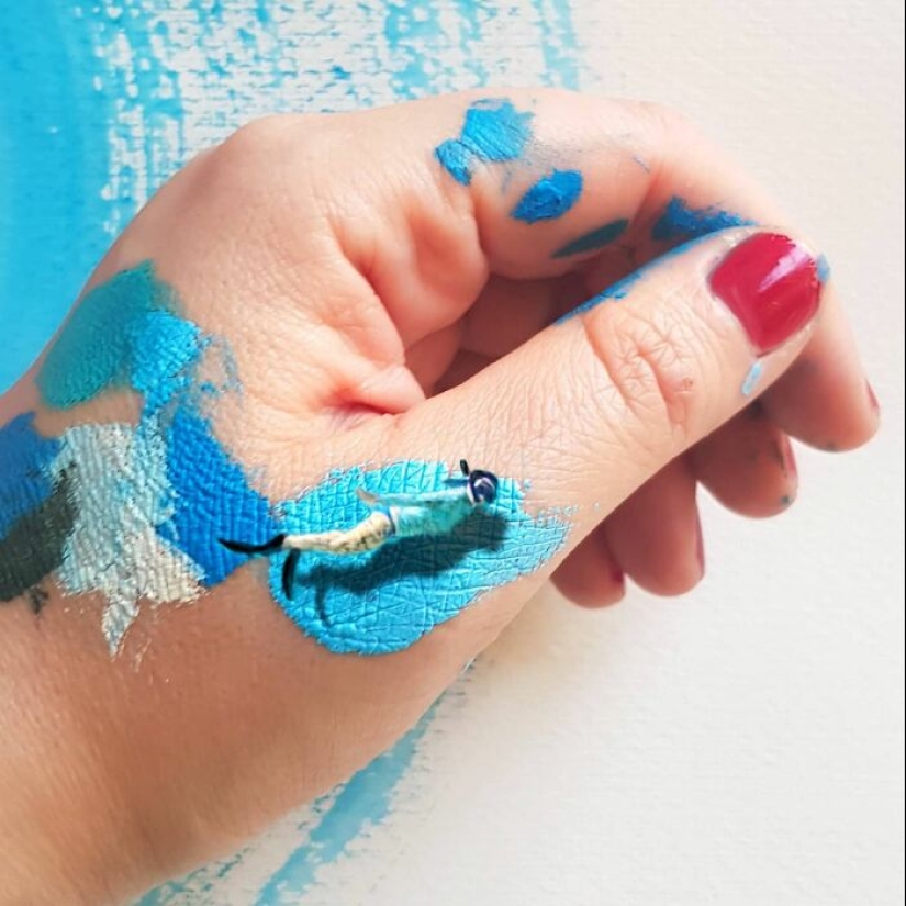 The artist uses her hands as a canvas to show hidden worlds