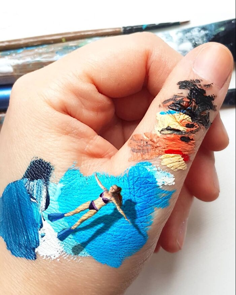 The artist uses her hands as a canvas to show hidden worlds