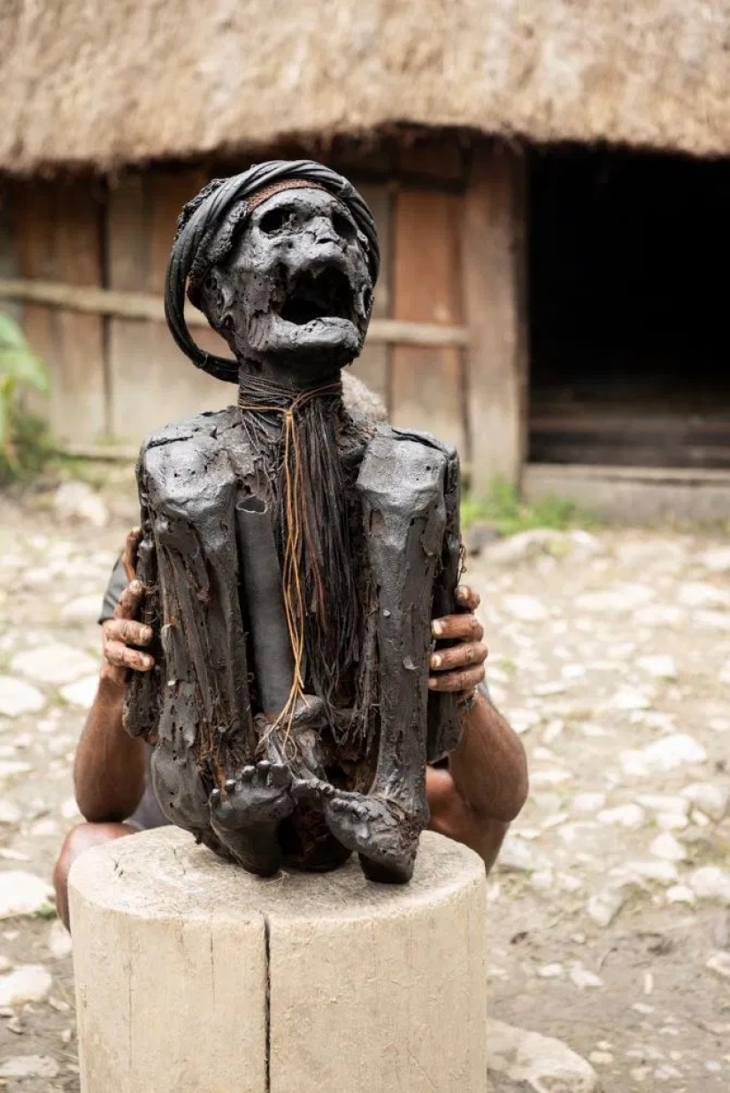 The spirit of the ancestors: in a Papuan tribe smoked mummies of leaders to save them for posterity