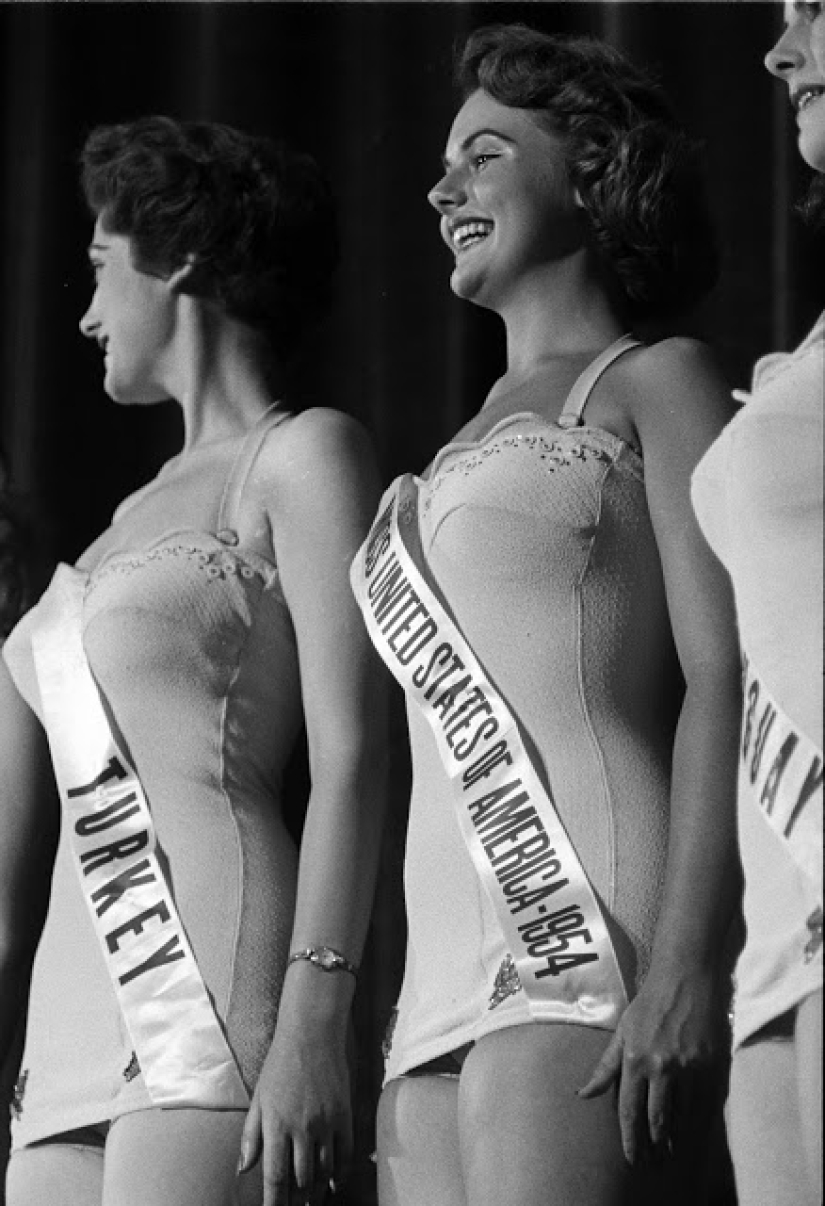 Watching the participants of the contest "Miss universe" 50 years