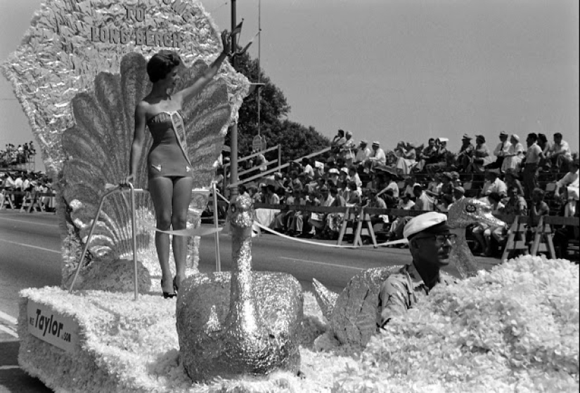 Watching the participants of the contest "Miss universe" 50 years