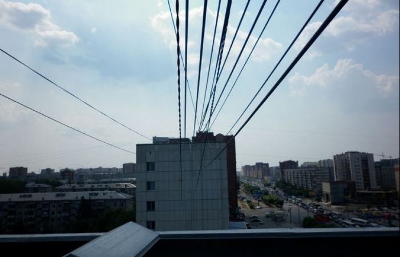 Who and why stretches wires between houses