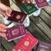 Why are only four colors used for passport covers in the world?