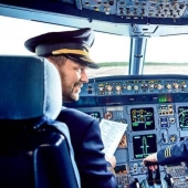 Why are pilots prohibited from wearing beards?