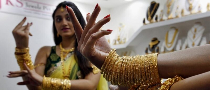 Why do the Indians have so much gold and what is the reason for its intense yellow color
