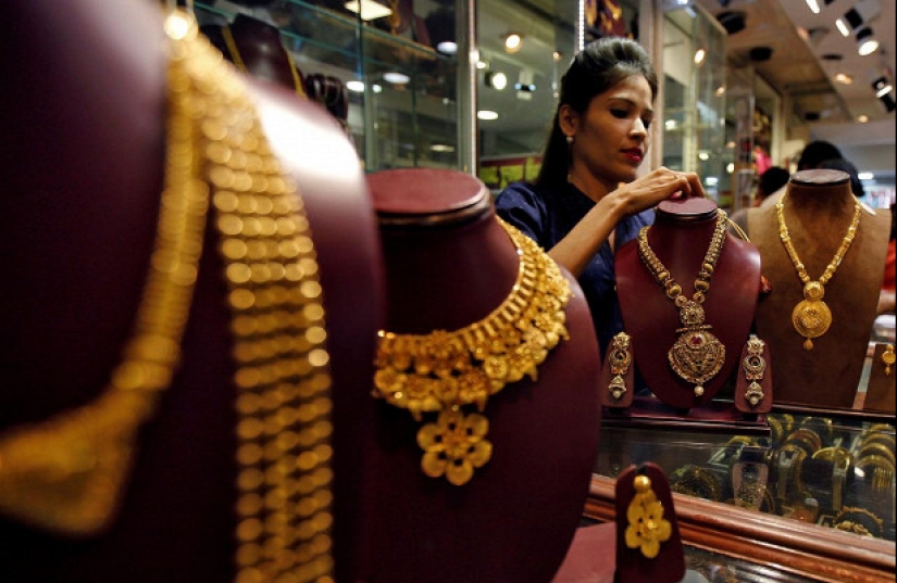 Why do the Indians have so much gold and what is the reason for its intense yellow color