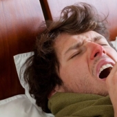 Why don't people sneeze in their sleep