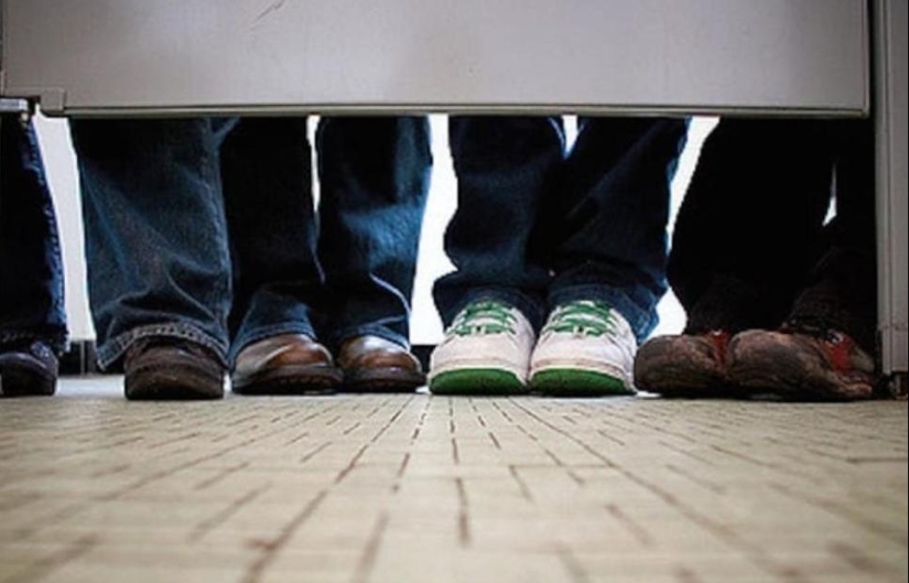 Why is there a large gap left under the door of the public toilet cubicle