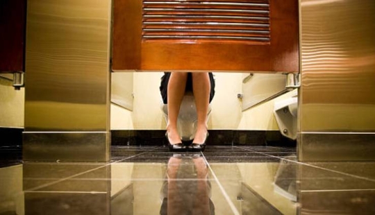 Why is there a large gap left under the door of the public toilet cubicle