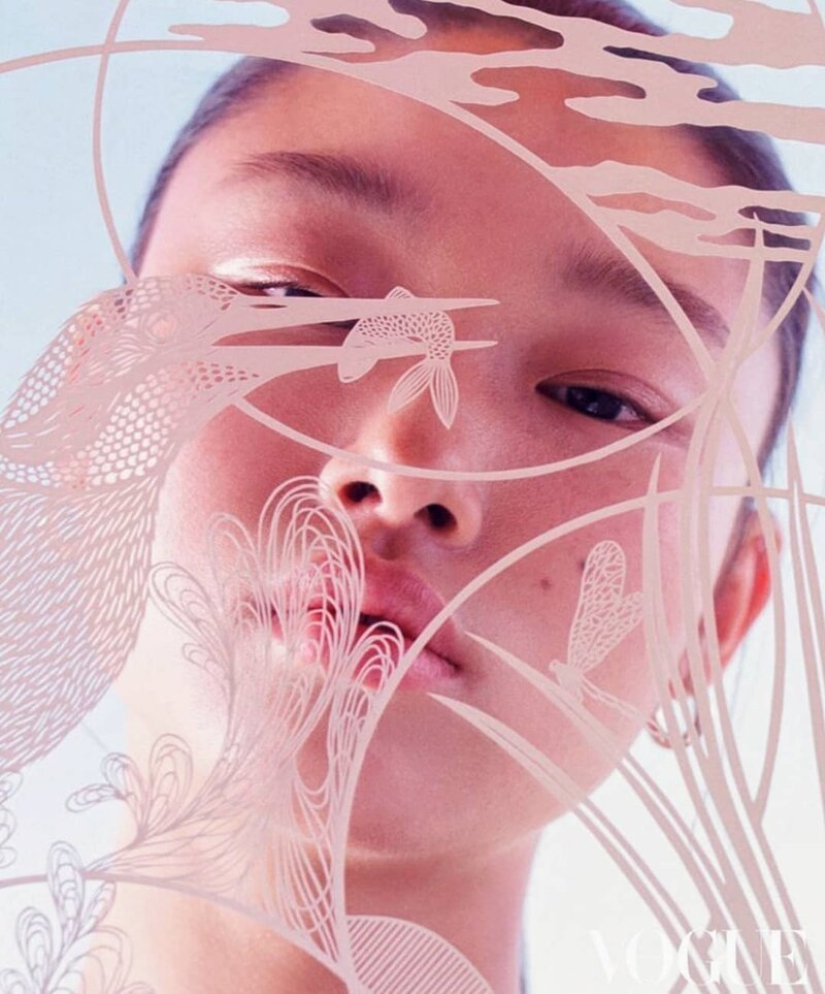 A girl cuts out intricate masterpieces from paper A girl cuts out intricate masterpieces from paper