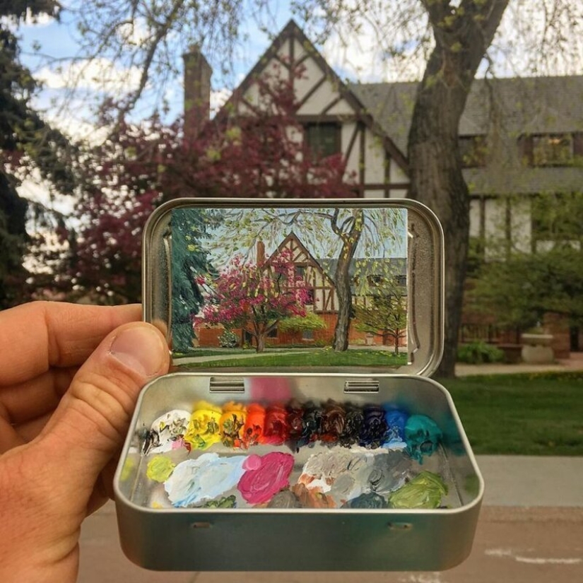 Artista dibuja las miniaturas de los paisajes en las cajas del caramelo