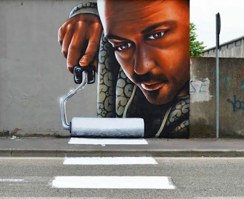 Callejero interactivo de arte: el artista entra en 3D pinturas en la calle