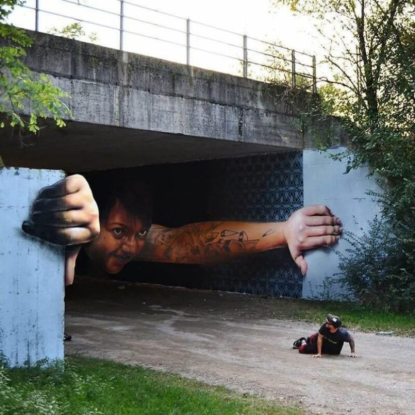 Callejero interactivo de arte: el artista entra en 3D pinturas en la calle