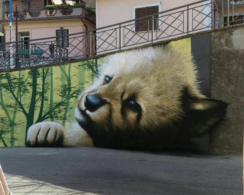 Callejero interactivo de arte: el artista entra en 3D pinturas en la calle