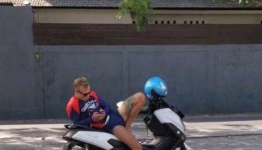 Look again — there is no girl on a motorcycle, no!