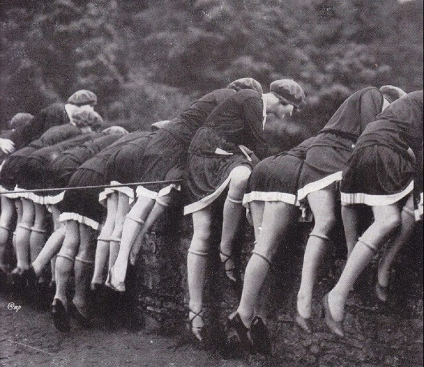 Obscene fashion of a century ago - stockings rolled up under the knee