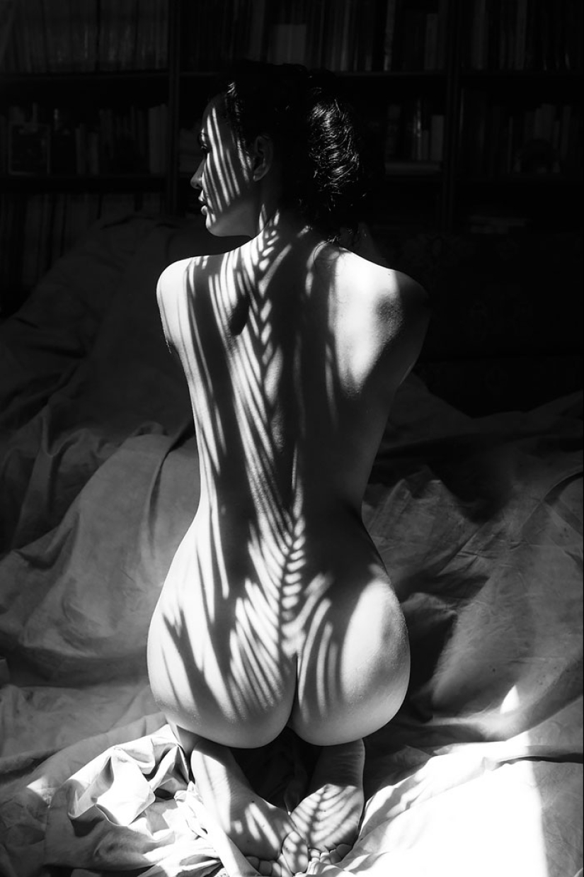 Photographer Emilio Jimenez covered the naked girls with a natural shadow