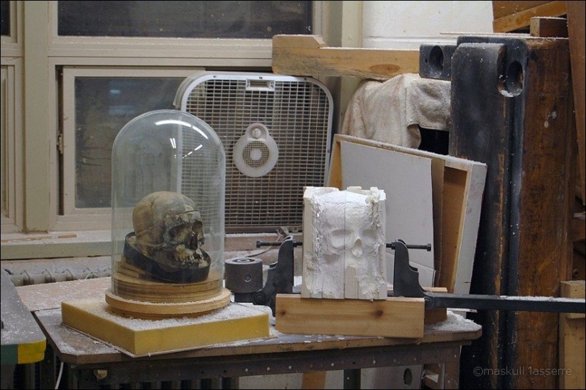 Step-by-step process of carving a skull from old books Step-by-step process of carving a skull from old books