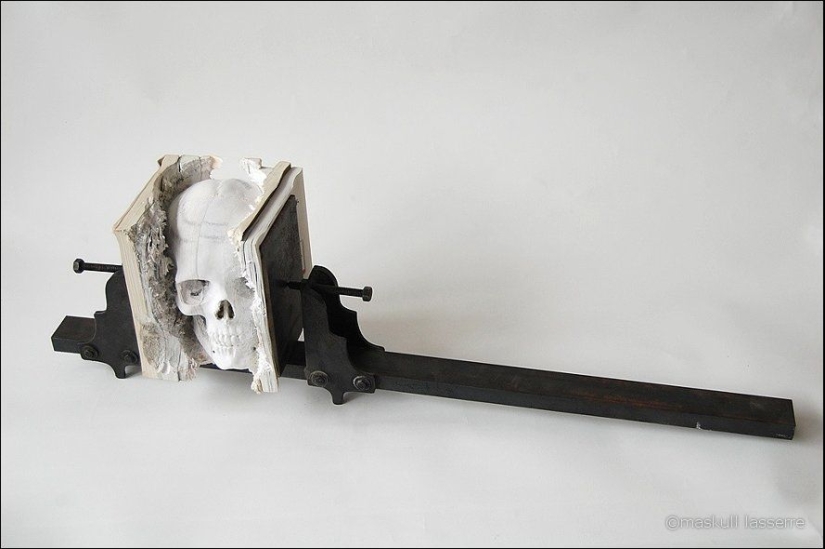 Step-by-step process of carving a skull from old books Step-by-step process of carving a skull from old books