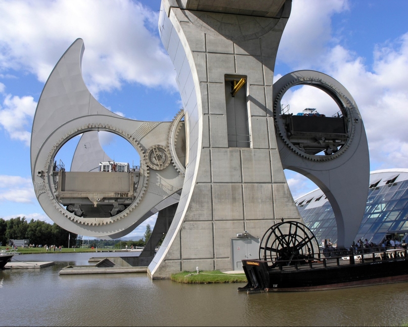 The Falkirk Wheel is a unique rotating structure that lifts entire ships