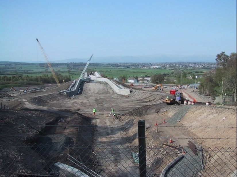 The Falkirk Wheel is a unique rotating structure that lifts entire ships